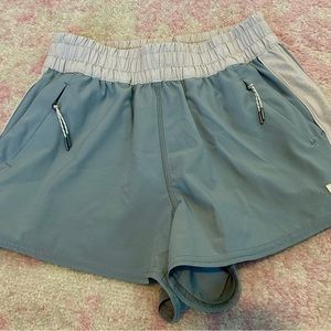 Vuori Women’s Unlined Dash Shorts; Light blue & white; Size XS